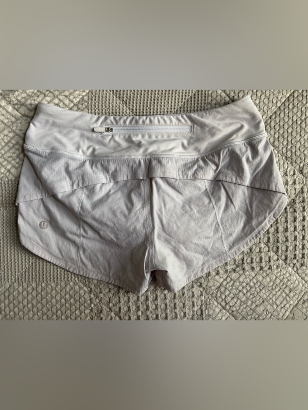 Lululemon white Run Shorts with Back Zip Pocket
Size 2 & 2.5in